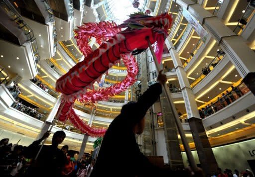 Dancers perform a dragon dance in a shopping mall in Jakarta on January 21. In 2003, the Lunar New Year was declared a national holiday and this year, nearly all of Jakarta's glitzy malls are festooned for the occasion