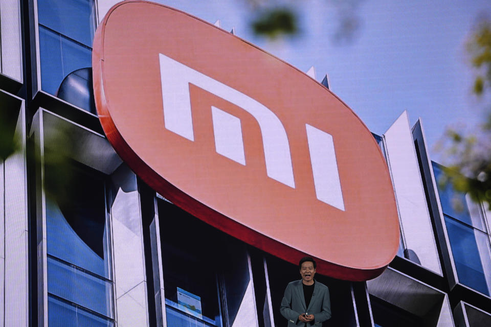 Xiaomi founder Lei Jun speaks at a launch event for the SU7, a sporty four-door sedan, in Beijing, Thursday, March 28, 2024. Xiaomi, a well-known maker of smart consumer electronics in China, is joining the country's booming but crowded market for electric cars. (AP Photo/Ng Han Guan)