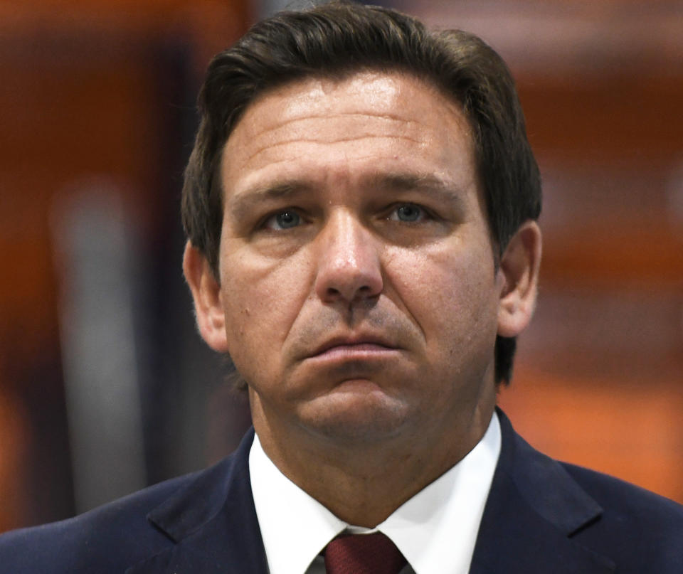 LAKELAND, FLORIDA, UNITED STATES - 2021/05/28: Florida Gov. Ron DeSantis listens at a press conference at LifeScience Logistics to urge the Biden administration to approve Florida's plan to import prescription drugs from Canada, thereby saving Floridians an estimated $100 million annually on drug costs. (Photo by Paul Hennessy/SOPA Images/LightRocket via Getty Images)