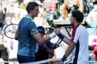 Mar 29, 2018; Key Biscayne, FL, USA; Pablo Carreno Busta of Spain (R) shakes hands with Kevin Anderson of South Africa (L) after their match on day ten of the Miami Open at Tennis Center at Crandon Park. Mandatory Credit: Geoff Burke-USA TODAY Sports