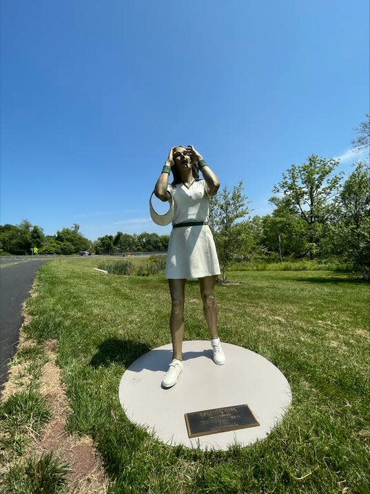 "Calling Girl" by  Seward Johnson is on display through Sept. 1 in Lower Makefield's Memorial Park.