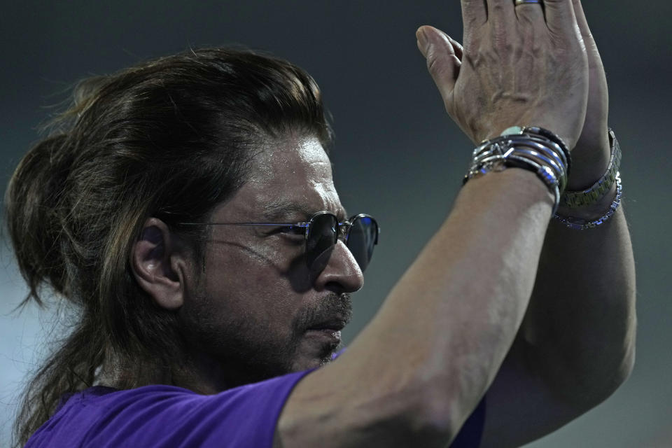 Bollywood actor Shahrukh Khan greets fans after Kolkata Knight Riders won the Indian Premier League cricket match against Lucknow Super Giants in Kolkata, India, Sunday, April 14, 2024. (AP Photo/Bikas Das)