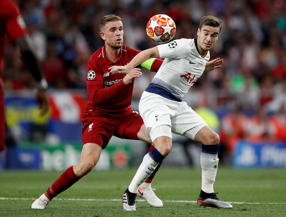 Liverpool's Jordan Henderson (left) and Tottenham Hotspur's Harry Winks (right) battle for the ball during the UEFA Champions League Final at the Wanda Metropolitano, Madrid.