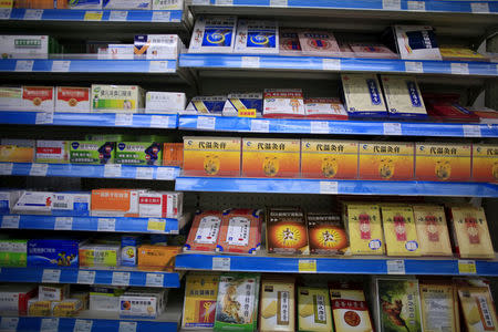 Shelves displaying medicines are seen at a pharmacy in Shanghai, China, November 27, 2015. REUTERS/Aly Song/File Photo
