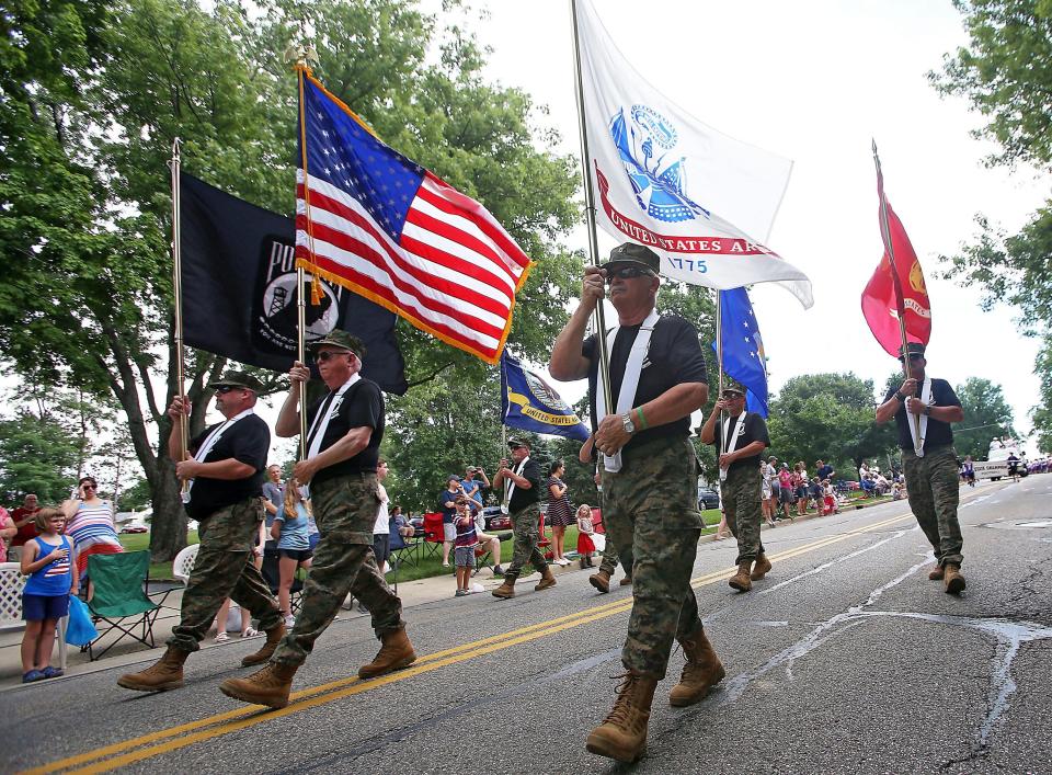 An honor guard from Pickerington American Legion Post 283 marches in the Pickerington Fourth of July Parade.