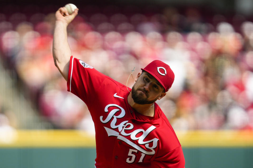 Cincinnati Reds starting pitcher Graham Ashcraft (51) throws against the Pittsburgh Pirates in the sixth inning of a baseball game in Cincinnati, Sunday, April 2, 2023. (AP Photo/Jeff Dean)