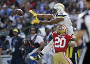 <p>Los Angeles Chargers wide receiver Tyrell Williams, top, makes a catch while under pressure from San Francisco 49ers defensive back Jimmie Ward during the second half of an NFL football game, Sunday, Sept. 30, 2018, in Carson, Calif. (AP Photo/Marcio Sanchez) </p>