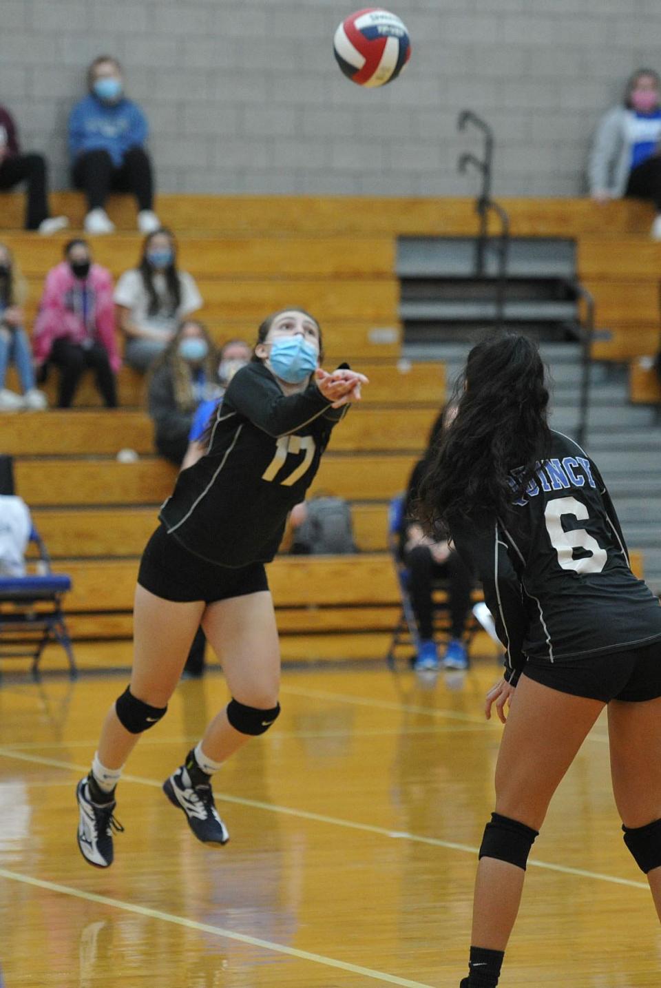 Quincy's Priscilla Bonica prepares to return a Hingham shot during volleyball action at Quincy High School, Thursday, Nov. 12, 2020.