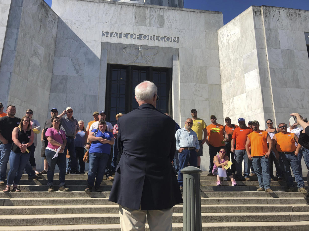 Senate President Peter Courtney addresses a group of loggers and truckers outside the Oregon Capitol on June 12 in Salem, Ore. (Photo: Sarah Zimmerman/ASSOCIATED PRESS)