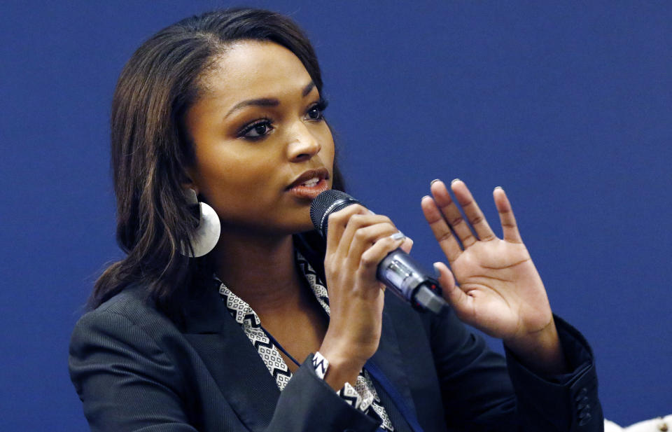 Miss Mississippi 2018 Asya Branch, discusses her impressions of being a child of an incarcerated parent during a discussion on criminal justice reform, at the Mississippi Summit on Criminal Justice Reform in Jackson, Miss., Tuesday, Dec. 11, 2018. The meeting was put on by a coalition of groups that favor changes to reduce harshness in the criminal justice system. Among issues lawmakers could consider are spending more on re-entry programs to help people coming out of prison from returning and setting up a statewide public defender system. (AP Photo/Rogelio V. Solis)