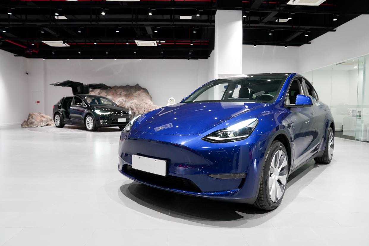 SHANGHAI, Jan. 18, 2021 -- A Tesla Model Y vehicle is pictured at a Tesla Center in east China's Shanghai, Jan. 18, 2021.
  U.S. electric carmaker Tesla Inc. on Monday began Shanghai deliveries of its built-in-China Model Y.
   On Jan. 7, 2020, Tesla launched the project to manufacture Model Y vehicles in its Shanghai Gigafactory, its first overseas plant outside the United States. The China-made model went on sale on Jan. 1. (Photo by Ding Ting/Xinhua via Getty) (Xinhua/Ding Ting via Getty Images)