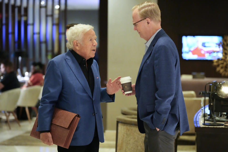 New England Patriots owner Robert Kraft, left, speaks with New York Giants president John K. Mara, right, at the NFL football owners spring meetings Wednesday, May 22, 2024, in Nashville, Tenn. (AP Photo/George Walker IV)