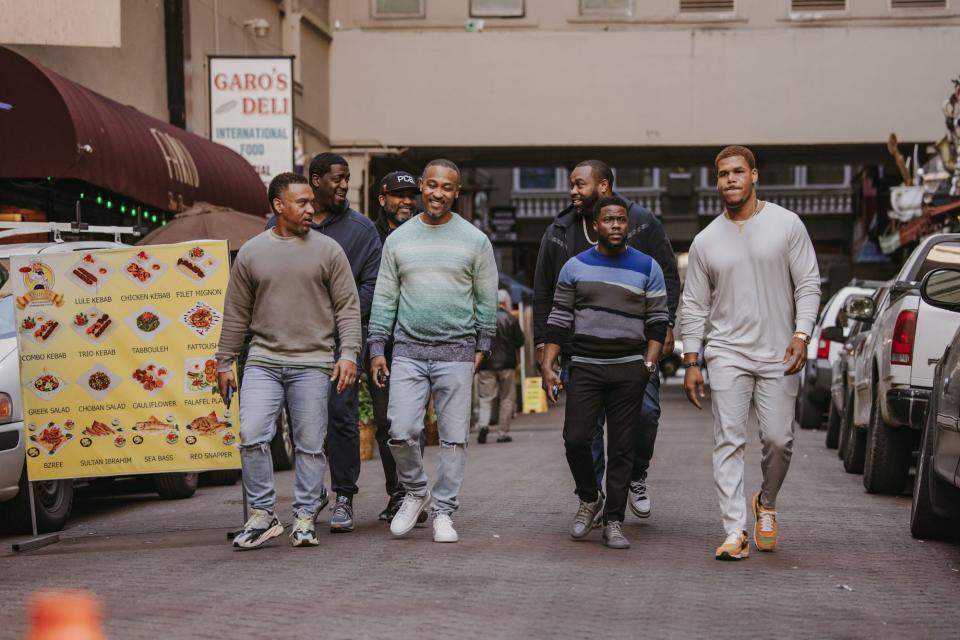 Kevin Hart (second from right) with members of his team in "Hart Of It All."