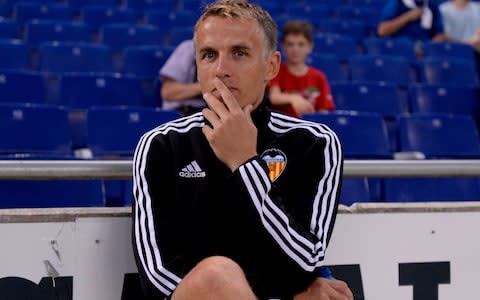 Phil Neville was once assistant coach of Valencia - Credit: AFP