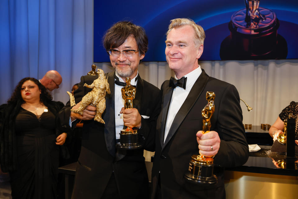 Hollywood, CA - March 10: Takashi Yamazaki and Christopher Nolan at the 96th Annual Academy Awards Governor's Ball located in the Ray Dolby Ballroom on the top level of  Ovation Hollywood in Hollywood, CA, Sunday, March 10, 2024. (Jason Armond / Los Angeles Times via Getty Images)