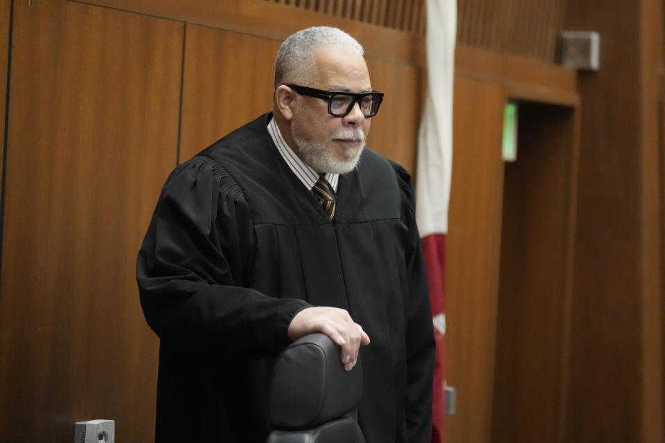 Judge Judge H. Clay Jacke walks into the courtroom to issue a ruling on the case of the People vs. Juan Rayford and Dupree Glass at the Clara Shortridge Foltz Criminal Justice Center Thursday, April 20, 2023, in Los Angeles. Rayford and Glass were convicted of attempted murder and sentenced to 11 consecutive life sentences. They served 17 years in prison before being released in 2020 after a judge ruled they were wrongfully convicted. (AP Photo/Marcio Jose Sanchez)