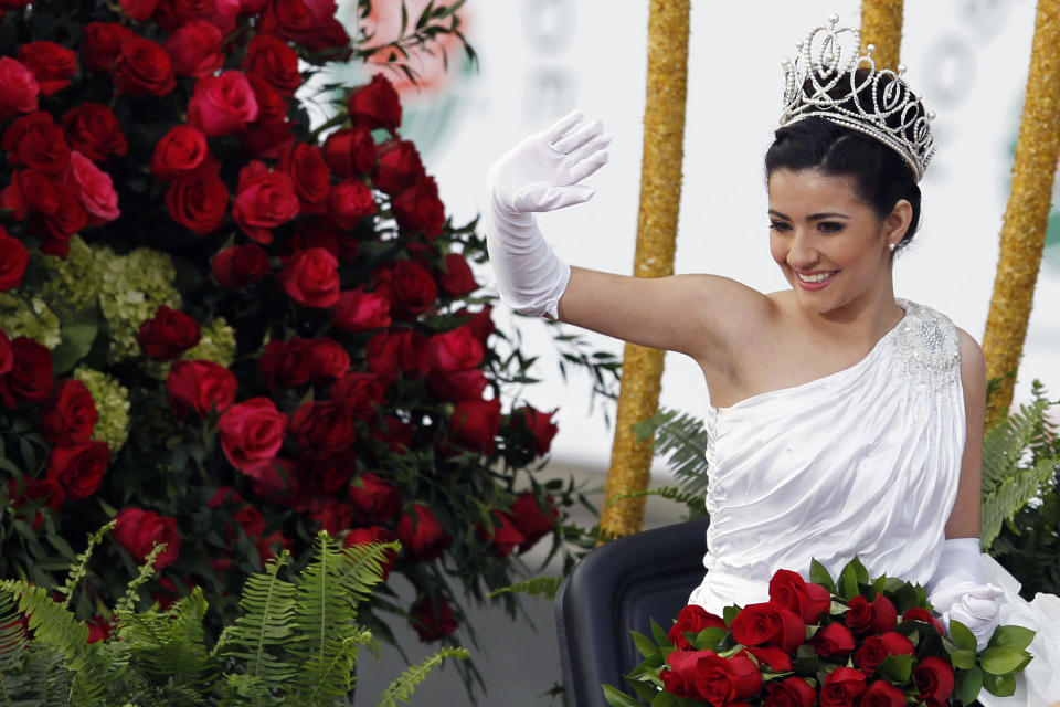 The 2013 Rose Queen Queen Vanessa Manjarrez rides a float in the 124th Rose Parade in Pasadena, Calif., Tuesday, Jan. 1, 2013. (AP Photo/Patrick T. Fallon)