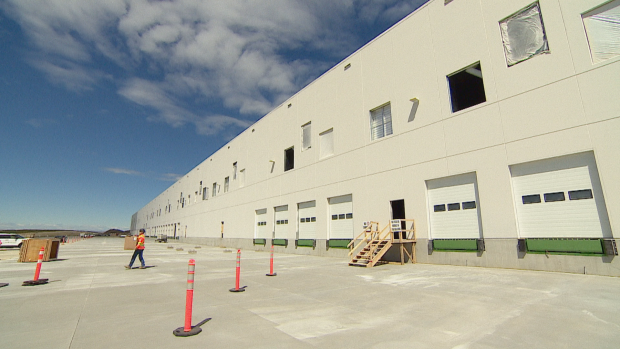 The new Amazon distribution facility in Balzac. Lower taxes and land values are some of the factors driving industrial development in Rocky View County. (Monty Kruger/CBC - image credit)