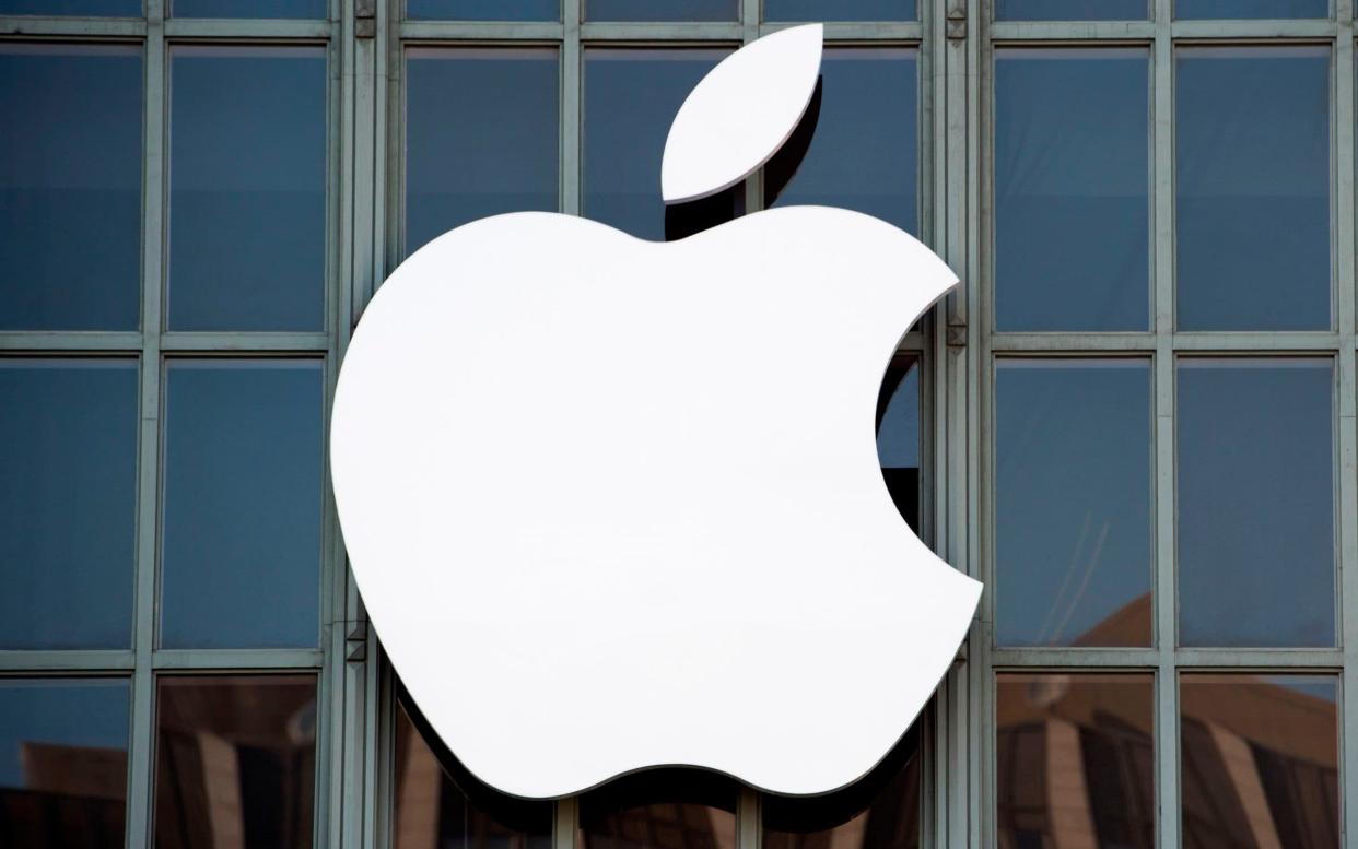 Apple has reportedly cut 200 employees from its secretive self-driving vehicle project - AFP