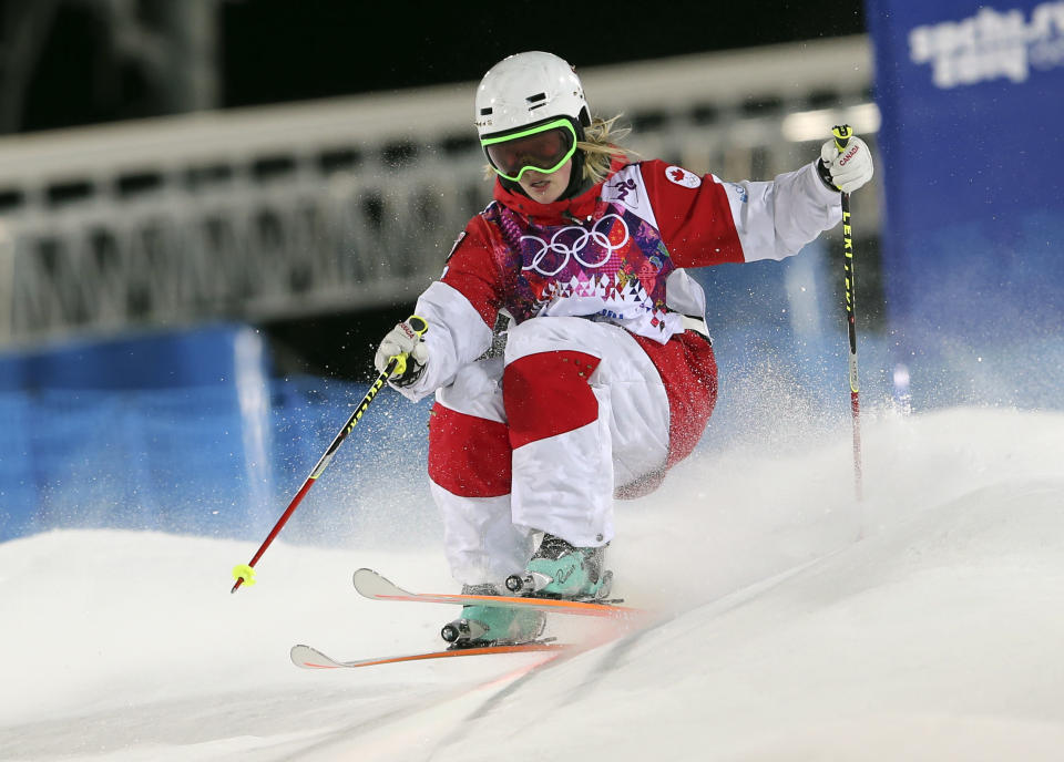 Canada's Justine Dufour-Lapointe competes in the women's moguls final 1 at the Rosa Khutor Extreme Park, at the 2014 Winter Olympics, Saturday, Feb. 8, 2014, in Krasnaya Polyana, Russia.(AP Photo/Sergei Grits)