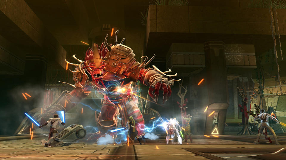 Star Wars: The Old Republic screenshot showing players lining up to fight a giant creature