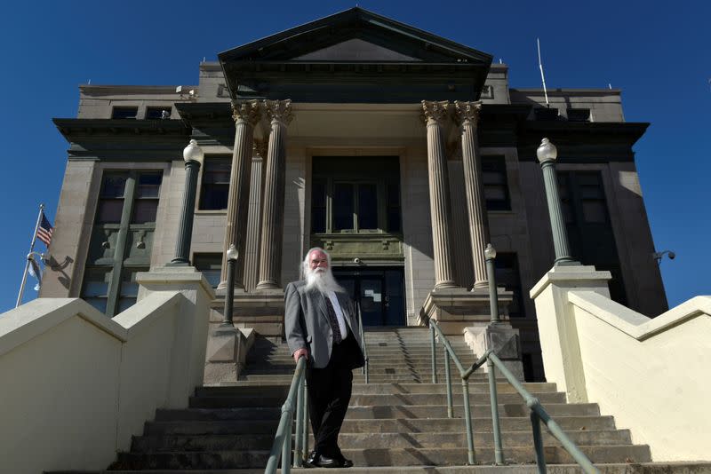 Lawyer Marty Meason poses for a portrait outside of the Osage County District Court in Pawhuska