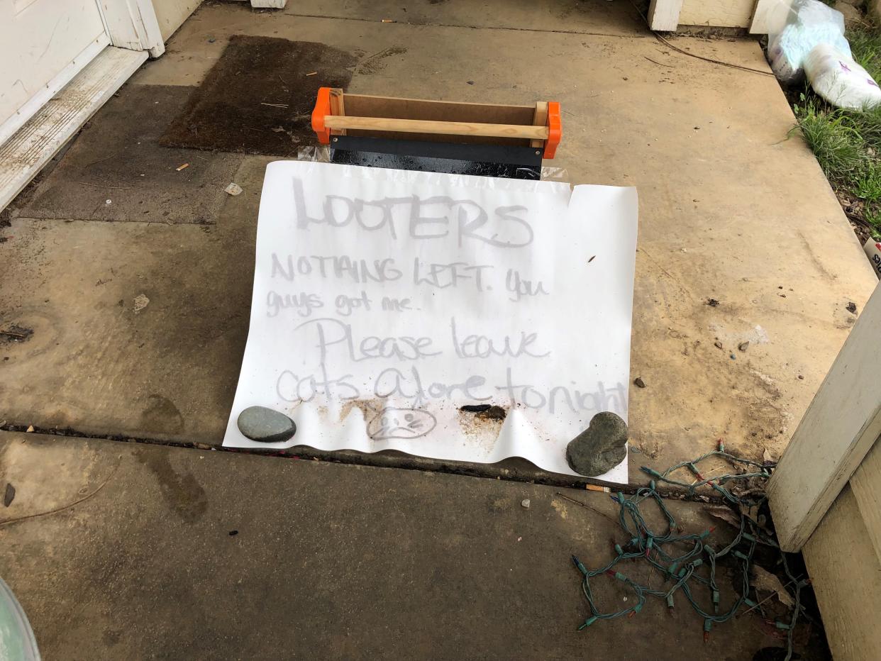 A sign was left out near Paul and Hattie Otto's home in Cottonwood after they were flooded out on March 14, 2023 and their house was burglarized twice.