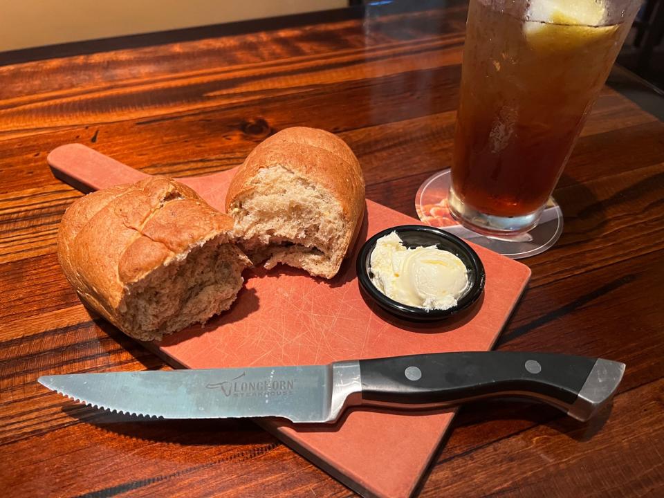 Fresh bread, sweet tea, and a Longhorn Steakhouse steak knife