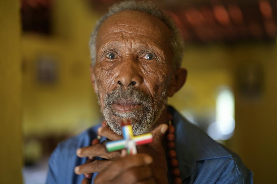 Claro Raimundo dos Santos, 82, the oldest resident of Sumidouro, poses for a photo in his home in Piaui state, Brazil, Wednesday, March 13, 2024. (AP Photo/Andre Penner)