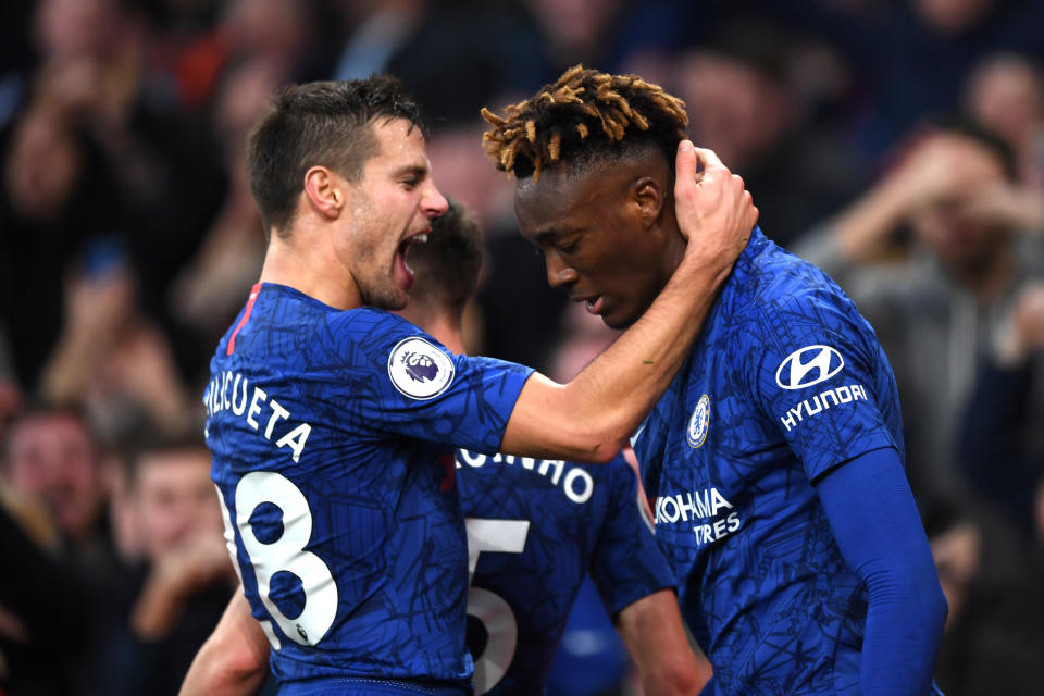 LONDON, ENGLAND - DECEMBER 29: Tammy Abraham of Chelsea celebrates with Cesar Azpilicueta of Chelsea after scoring his sides second goal during the Premier League match between Arsenal FC and Chelsea FC at Emirates Stadium on December 29, 2019 in London, United Kingdom. (Photo by Shaun Botterill/Getty Images)