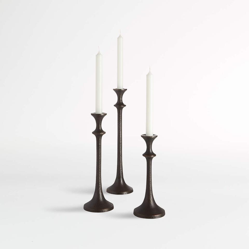 <p><a href="https://go.redirectingat.com?id=74968X1596630&url=https%3A%2F%2Fwww.potterybarn.com%2Fproducts%2Frio-bronze-taper-holders-set-of-3%2F&sref=https%3A%2F%2F" rel="nofollow noopener" target="_blank" data-ylk="slk:Shop Now;elm:context_link;itc:0;sec:content-canvas" class="link ">Shop Now</a></p><p>Rio Bronze Taper Holders</p><p>potterybarn.com</p><p>$89.00</p>