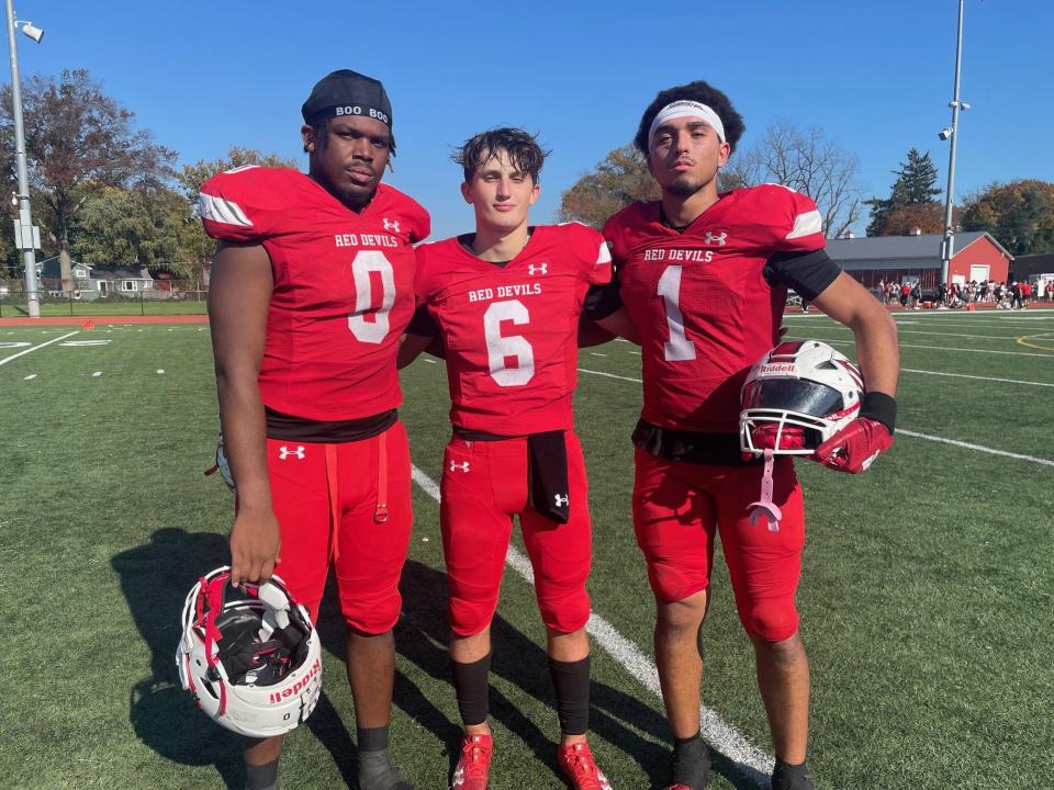 Rancocas Valley's Malachi Castle, left, Nick Marco, center, and Damien Peterson helped the Red Devils defeat Lenape 13-3 in the Central Jersey Group 5 quarterfinals on Saturday afternoon.