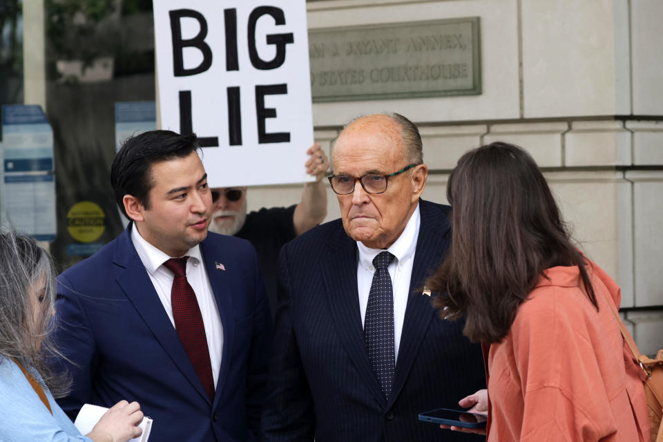  Former New York City Mayor and former personal lawyer for former President Donald Trump Rudy Giuliani talks to members of the press before he leaves the U.S. District Court on May 19, 2023 in Washington, DC.  / Credit: Alex Wong  / Getty Images