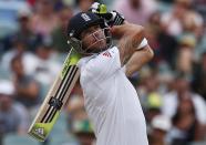 England's Kevin Pietersen watches his shot after hitting a six during the fourth day of the second Ashes test cricket match against Australia at the Adelaide Oval December 8, 2013.