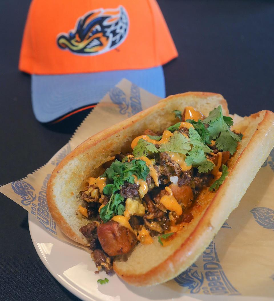 Spatz & Amanda's Bases Loaded Breakfast Burger, named after the 97.5 WONE morning show hosts, is one of the Akron RubberDucks' new extreme menu additions this season at Canal Park.