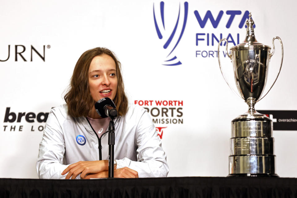 Iga Swiatek, of Poland, talks during a press conference at the WTA Finals tennis tournament in Fort Worth, Texas, Saturday, Oct. 29, 2022. (AP Photo/Ron Jenkins)