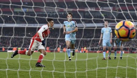 Football Soccer Britain - Arsenal v Burnley - Premier League - Emirates Stadium - 22/1/17 Arsenal's Alexis Sanchez scores their second goal from the penalty spot Reuters / Dylan Martinez Livepic