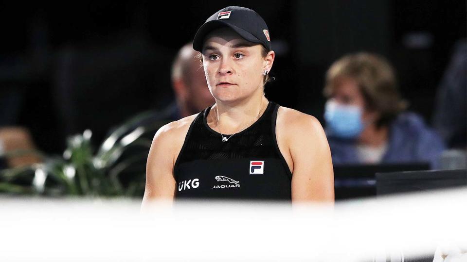 Ash Barty (pictured) during a change of ends in the tennis.