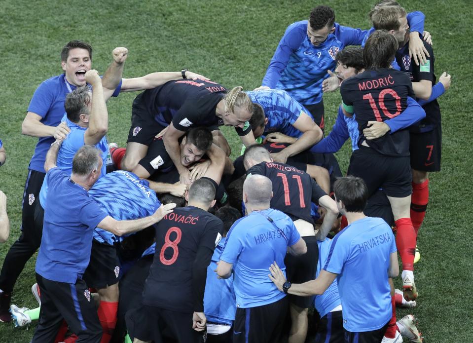 <p>Croatians players celebrate after beating Denmark on penalties </p>