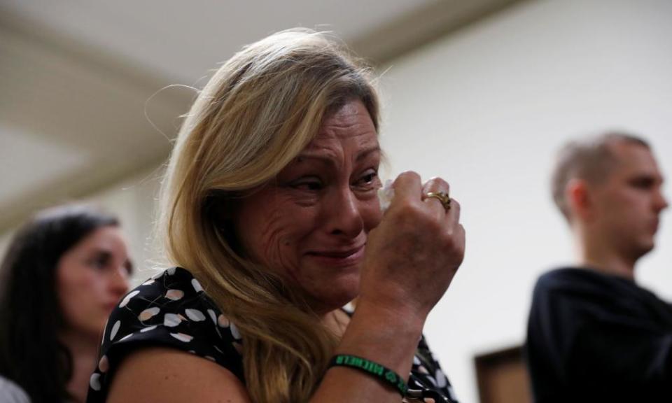 Mary Vega, whose son Alex Vega died in the fire, weeps during a press conference after the trial.