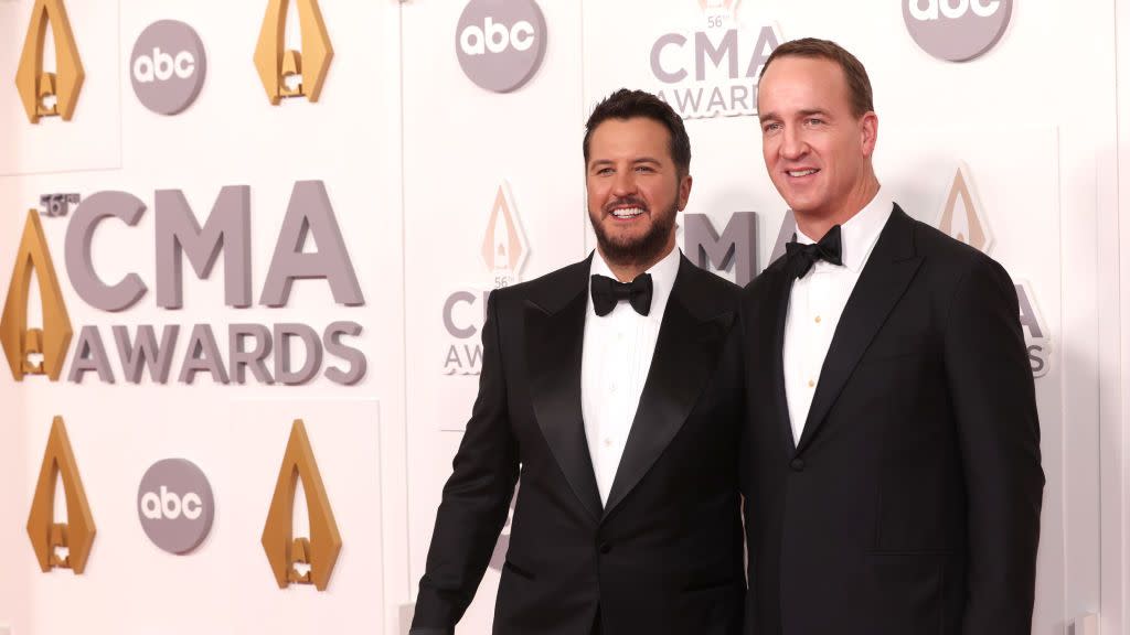 nashville, tennessee november 09 hosts, luke bryan and peyton manning attend the 56th annual cma awards at bridgestone arena on november 09, 2022 in nashville, tennessee photo by sara kaussfilmmagic