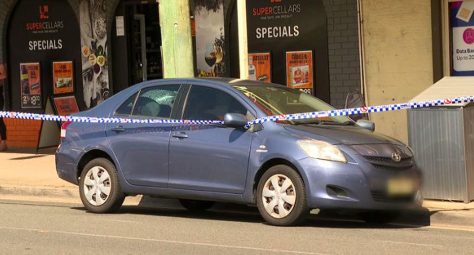 Crime scene with car at Glenfield, Sydney southwest. 