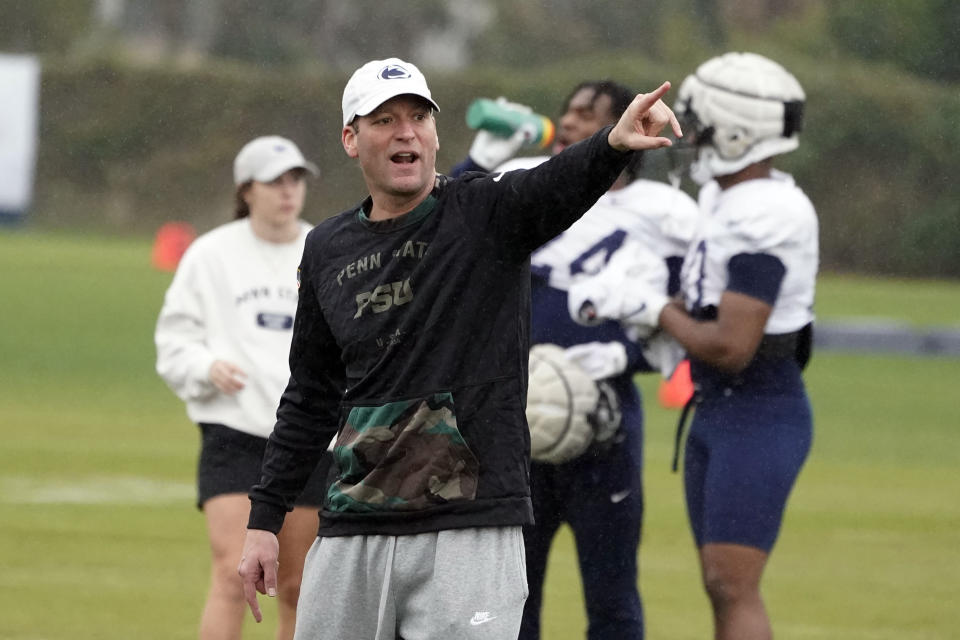 Penn State offensive coordinator Mike Yurcich instructs the offense during practice ahead of the Rose Bowl NCAA college football game against Utah, Friday, Dec. 30, 2022, in Carson, Calif. (AP Photo/Marcio Jose Sanchez)