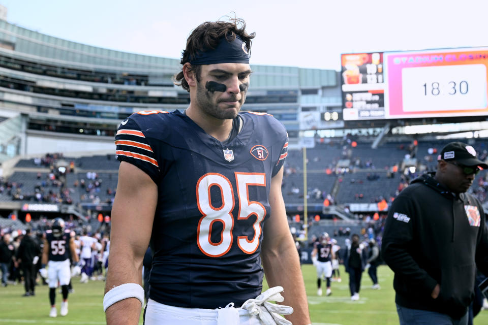 CHICAGO, ILLINOIS – OCTOBER 15: Cole Kmet #85 of the Chicago Bears walks off the field after a loss to the Minnesota Vikings at Soldier Field on October 15, 2023 in Chicago, Illinois. (Photo by Quinn Harris/Getty Images)