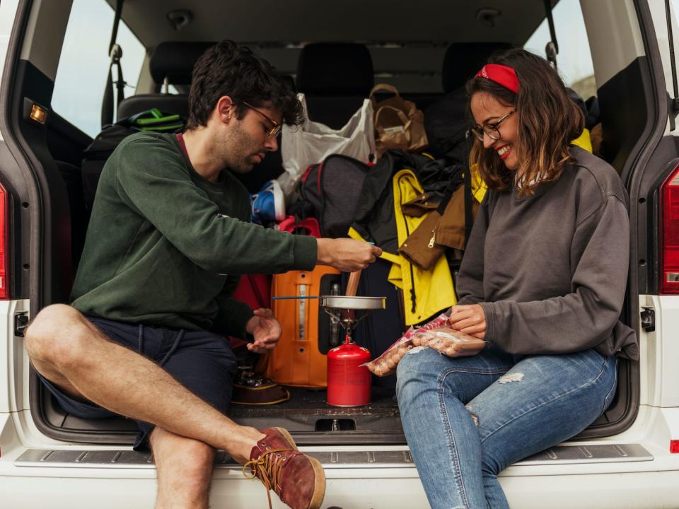 couple tailgate camping