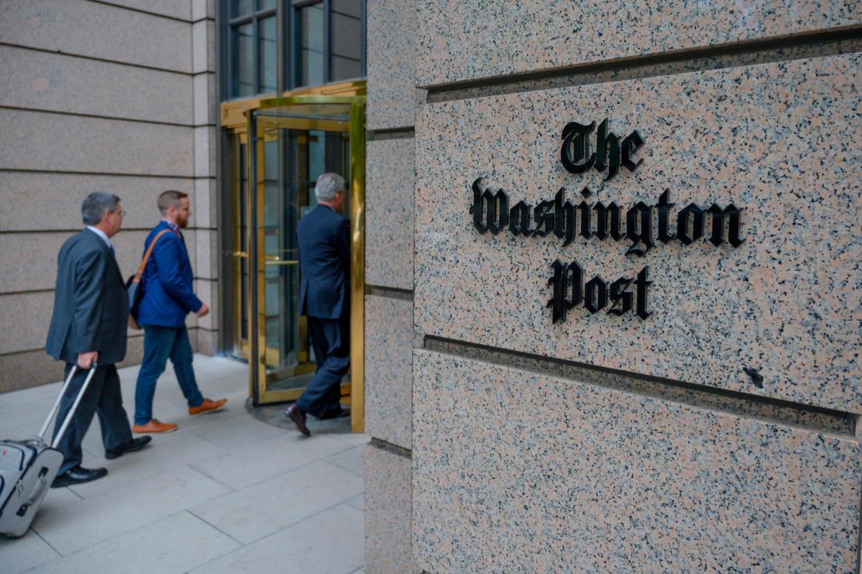 <p>The building of the Washington Post newspaper headquarter is seen on K Street in Washington DC on May 16, 2019. </p> ((Photo by ERIC BARADAT/AFP via Getty Images))