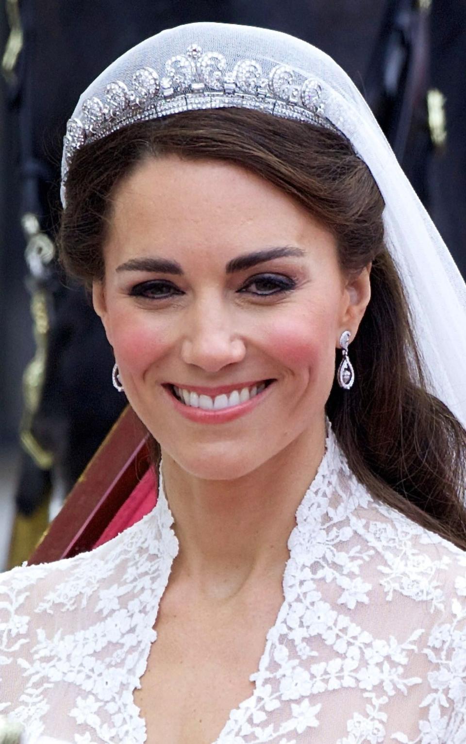 The Duchess of Cambridge on her wedding day wearing custom-made Robinson Pelham diamond earrings - Credit: Willi Schneider/REX/Shutterstock