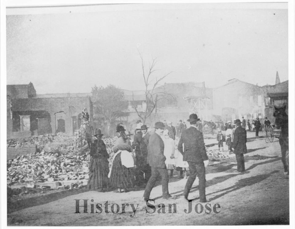 This 1887 photo provided by History San Jose, part of the History San Jose Photographic Collection, shows Market Street in Chinatown just after an arson fire in San Jose, Calif. More than a century after arsonists burned it to the ground in 1887, the San Jose City Council on Tuesday, Sept. 28, 2021, unanimously approved a resolution to apologize to Chinese immigrants and their descendants for the role the city played in “systemic and institutional racism, xenophobia, and discrimination.” (San Jose Research Library & Archives/History San Jose via AP)