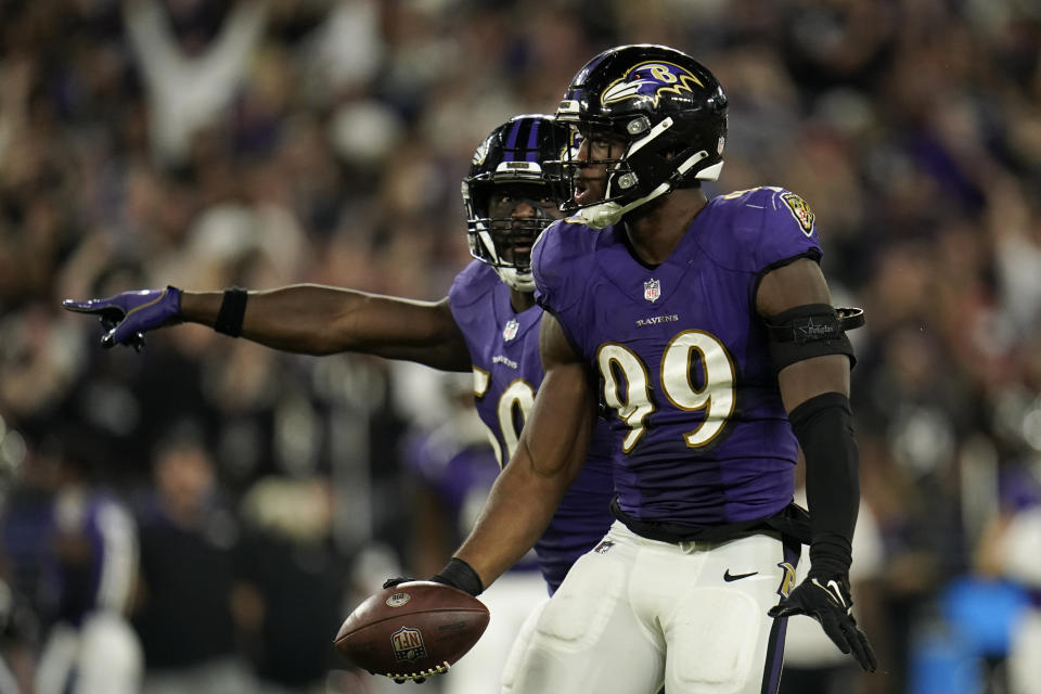 Baltimore Ravens linebacker Odafe Oweh celebrates after recovering a Kansas City Chiefs fumble in the second half of an NFL football game, Sunday, Sept. 19, 2021, in Baltimore. Baltimore won 36-35. (AP Photo/Julio Cortez)