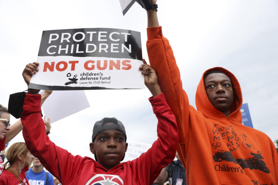 Demonstrators attend a March for Our Lives rally against gun violence on the National Mall June 11, 2022 in Washington, DC. (Photo by Tasos Katopodis/Getty Images)